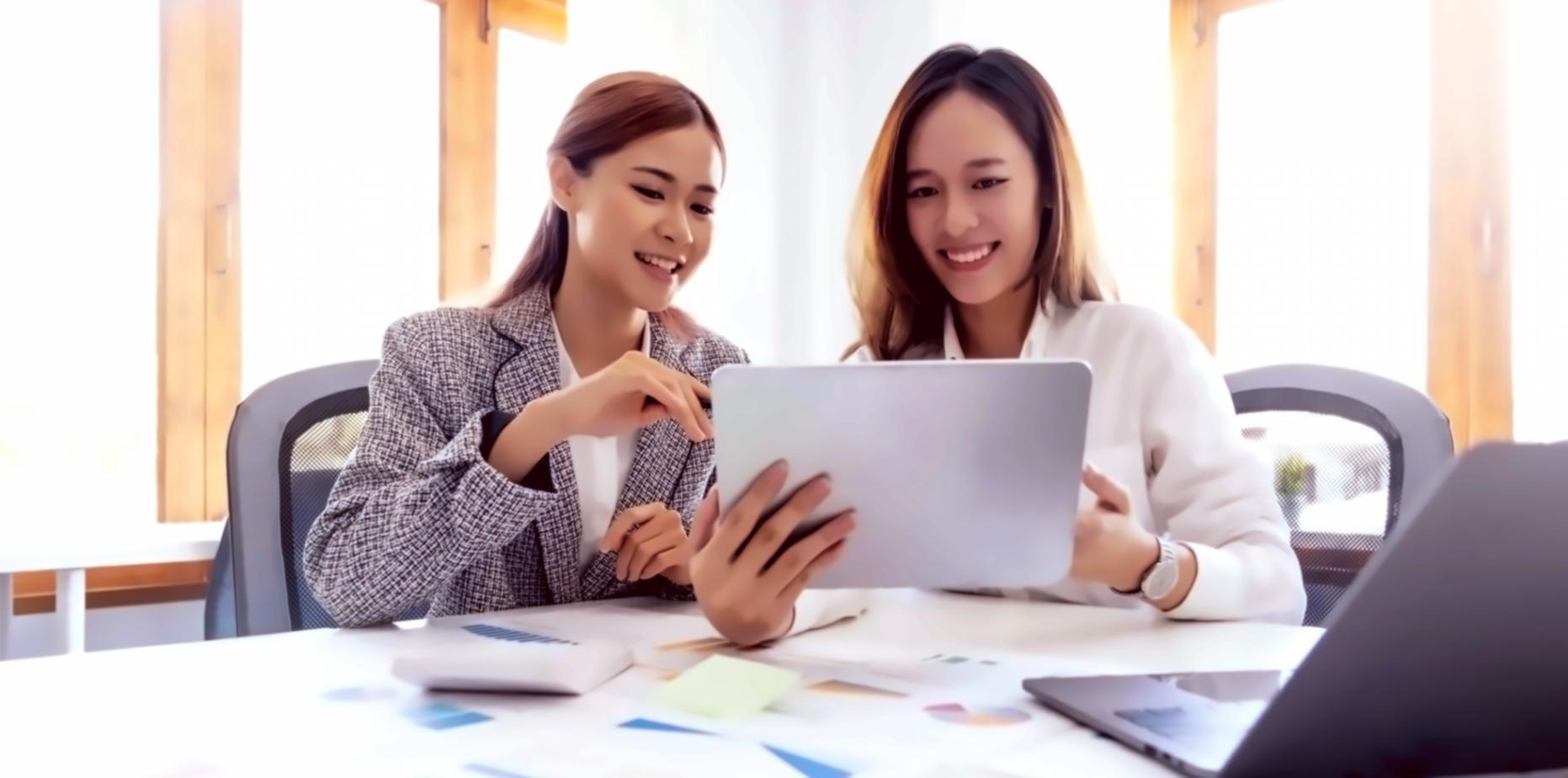 Instructor reviewing student work during personalized learning session