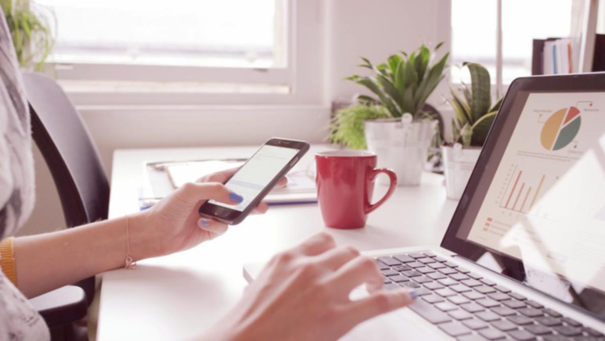 Students working collaboratively in a well-equipped learning space with computers and instructional materials